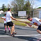 Nelson Mullins employee playing tug of war